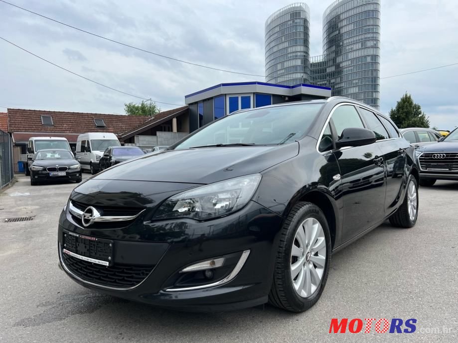 2015' Opel Astra Karavan photo #1