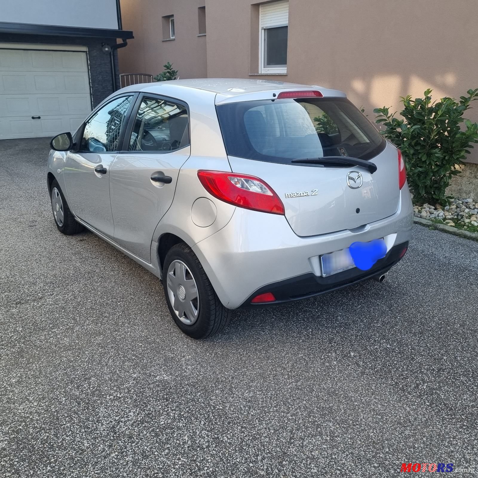 2009' Mazda 2 1,3 I Ce photo #2