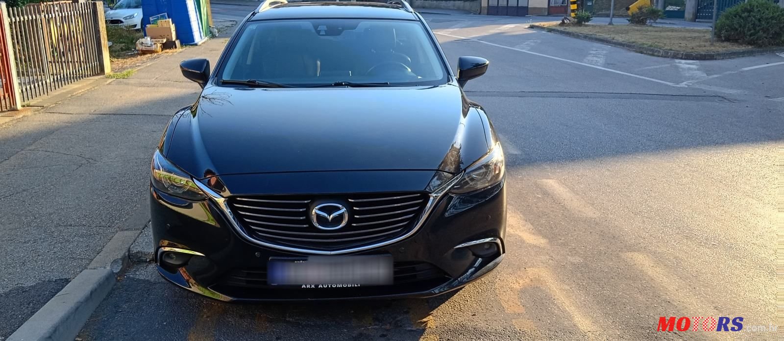 2015' Mazda 6 Sport Combi photo #1