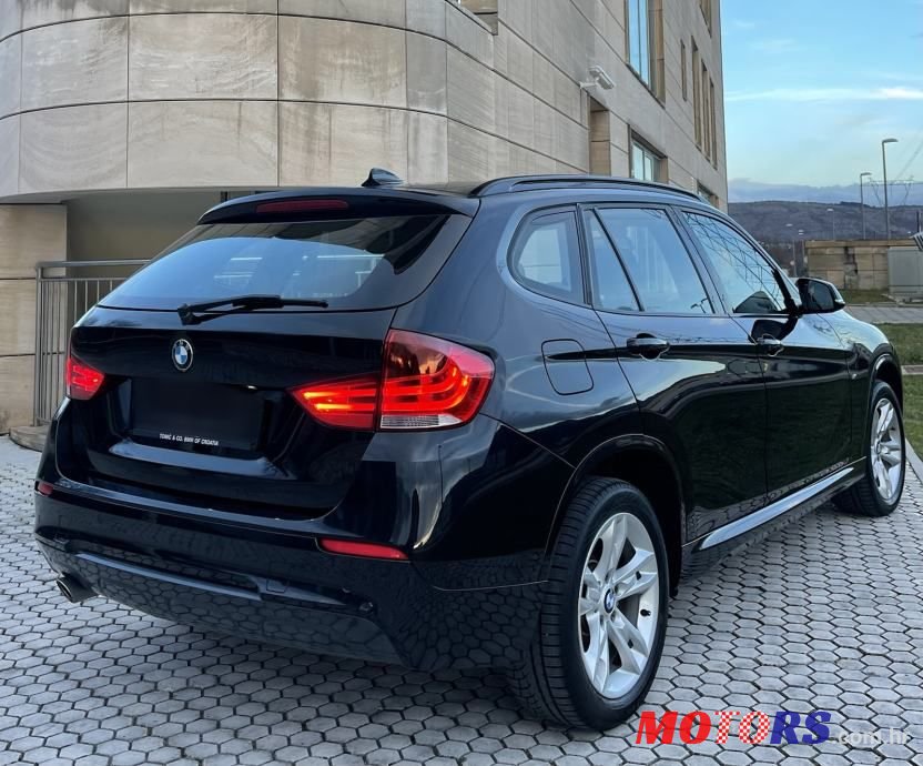 2013' BMW X1 Xdrive18D photo #6