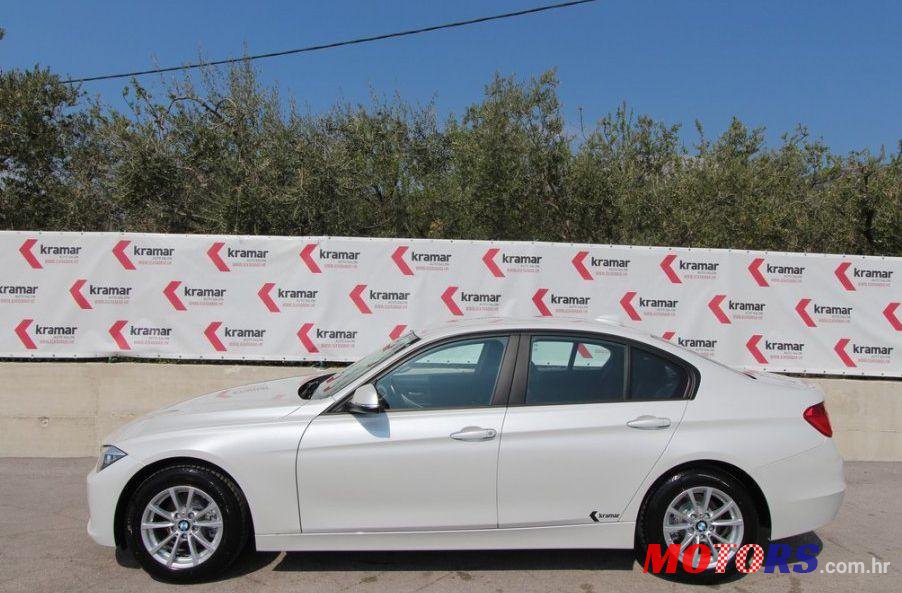 2014' BMW 3 Series 316D photo #1