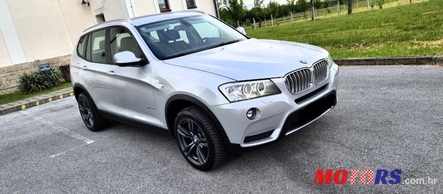 2011' BMW X3 Xdrive20D photo #1