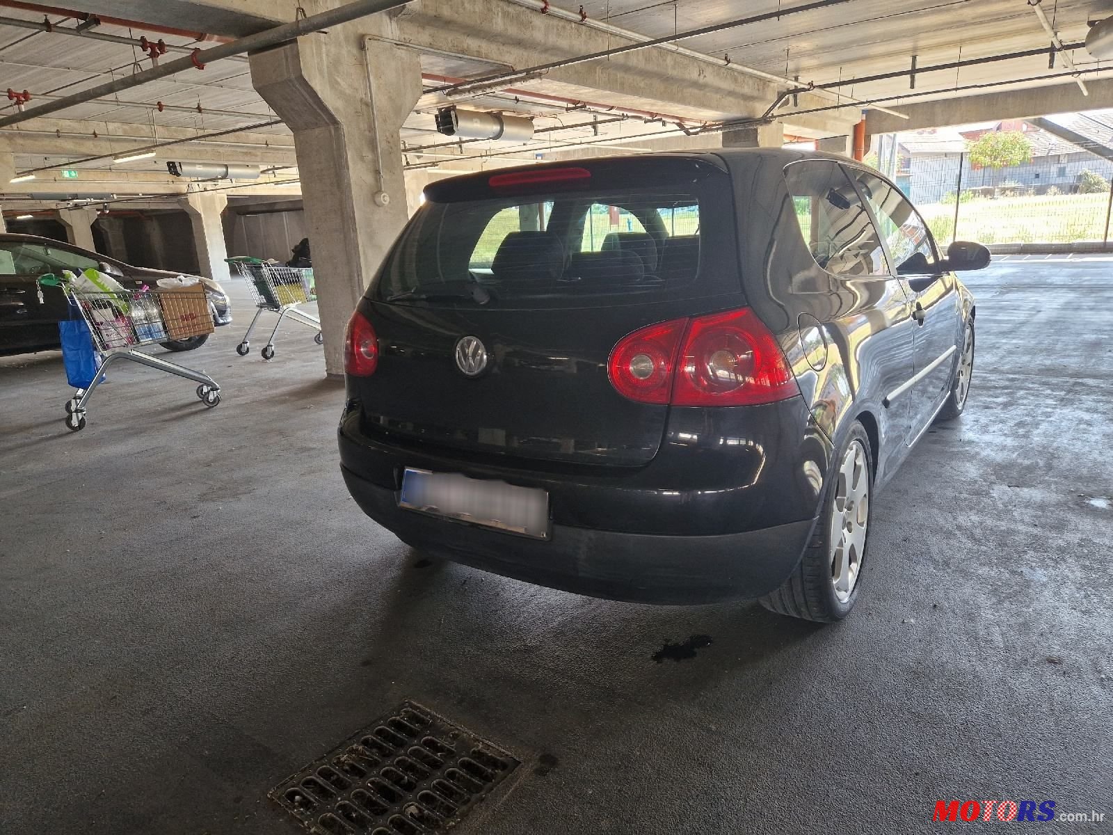 2004' Volkswagen Golf V 1,4 photo #5