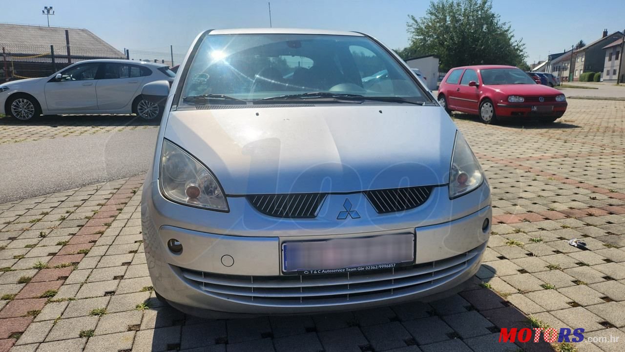 2006' Mitsubishi Colt 1,1 photo #3