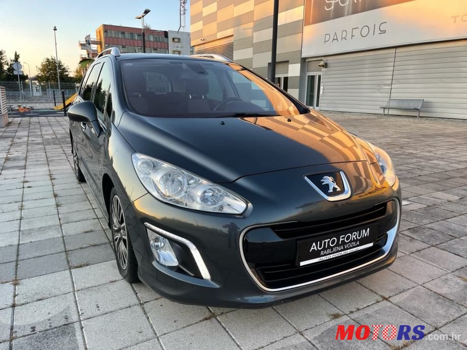 2012' Peugeot 308 Sw photo #1