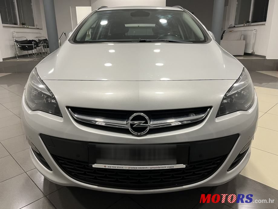 2015' Opel Astra Karavan photo #2