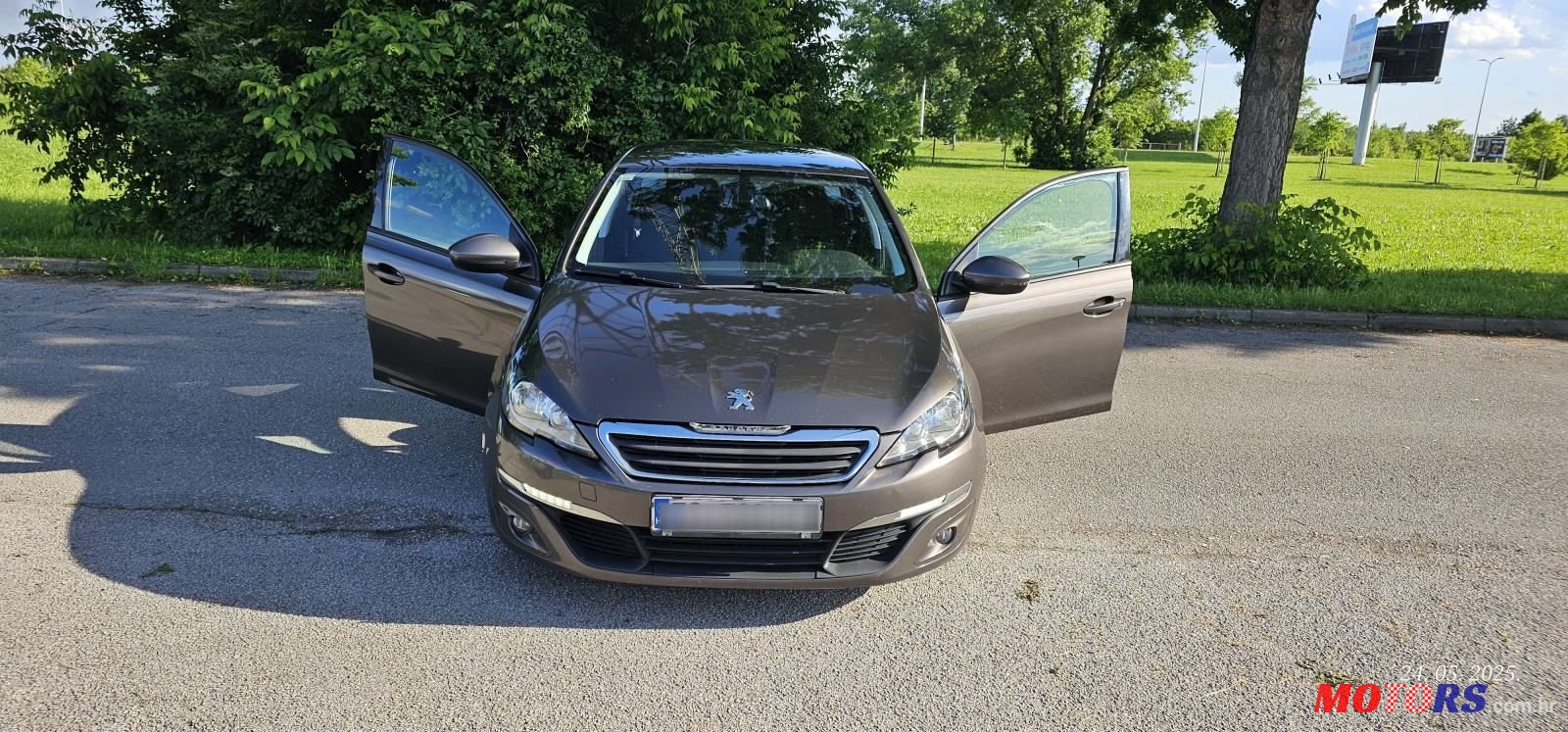 2014' Peugeot 308 Sw photo #1