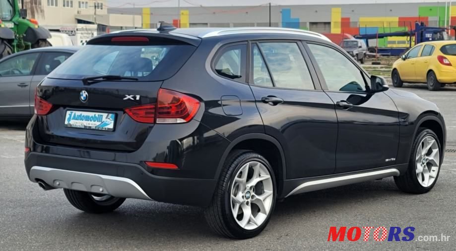 2014' BMW X1 Sdrive18D photo #5