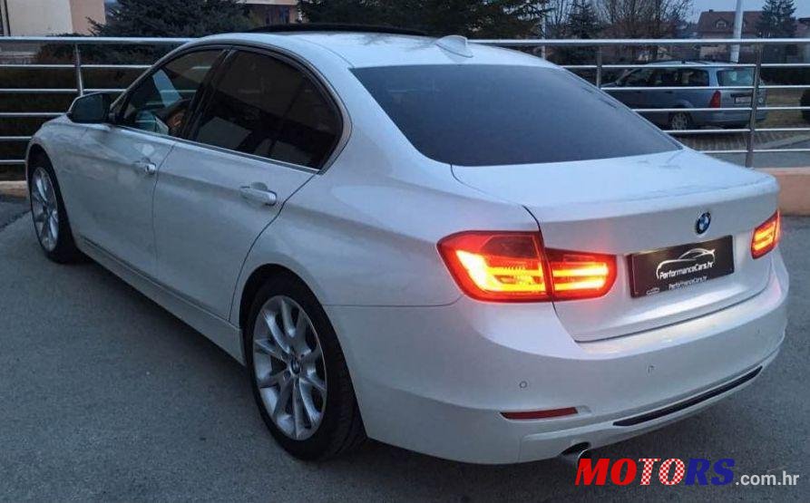 2012' BMW 3 Series 320D photo #1