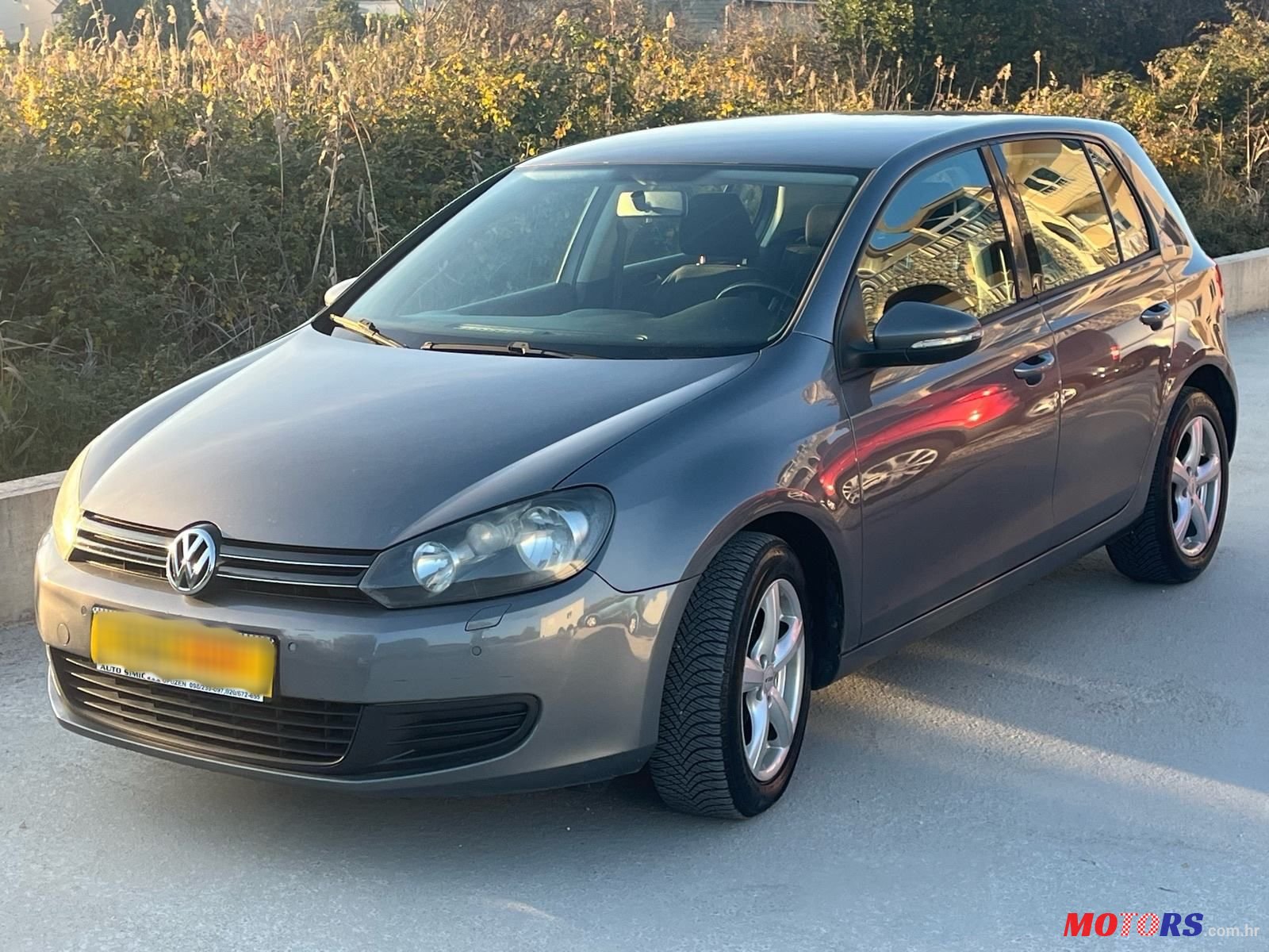 2009' Volkswagen Golf VI 1,6 Tdi photo #1