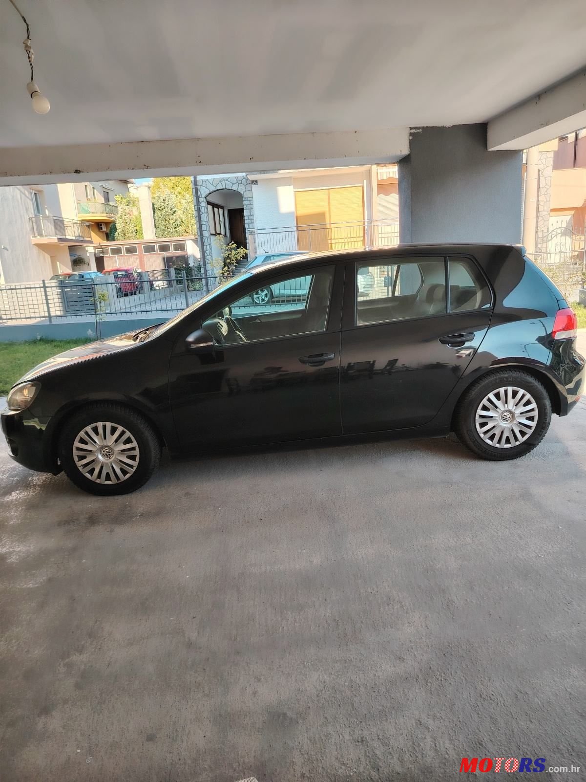 2012' Volkswagen Golf VI 1,6 Tdi photo #5