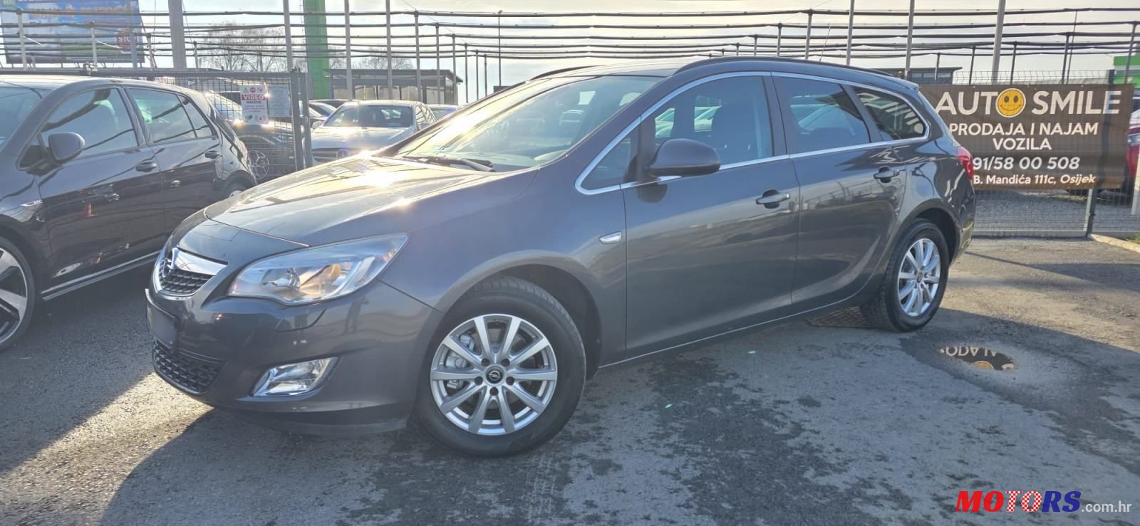 2012' Opel Astra Karavan photo #1