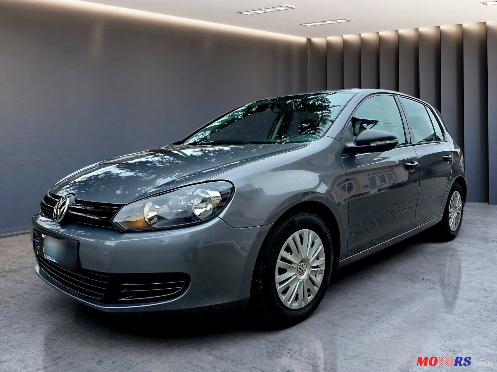 2011' Volkswagen Golf VI 1,6 Tdi photo #2