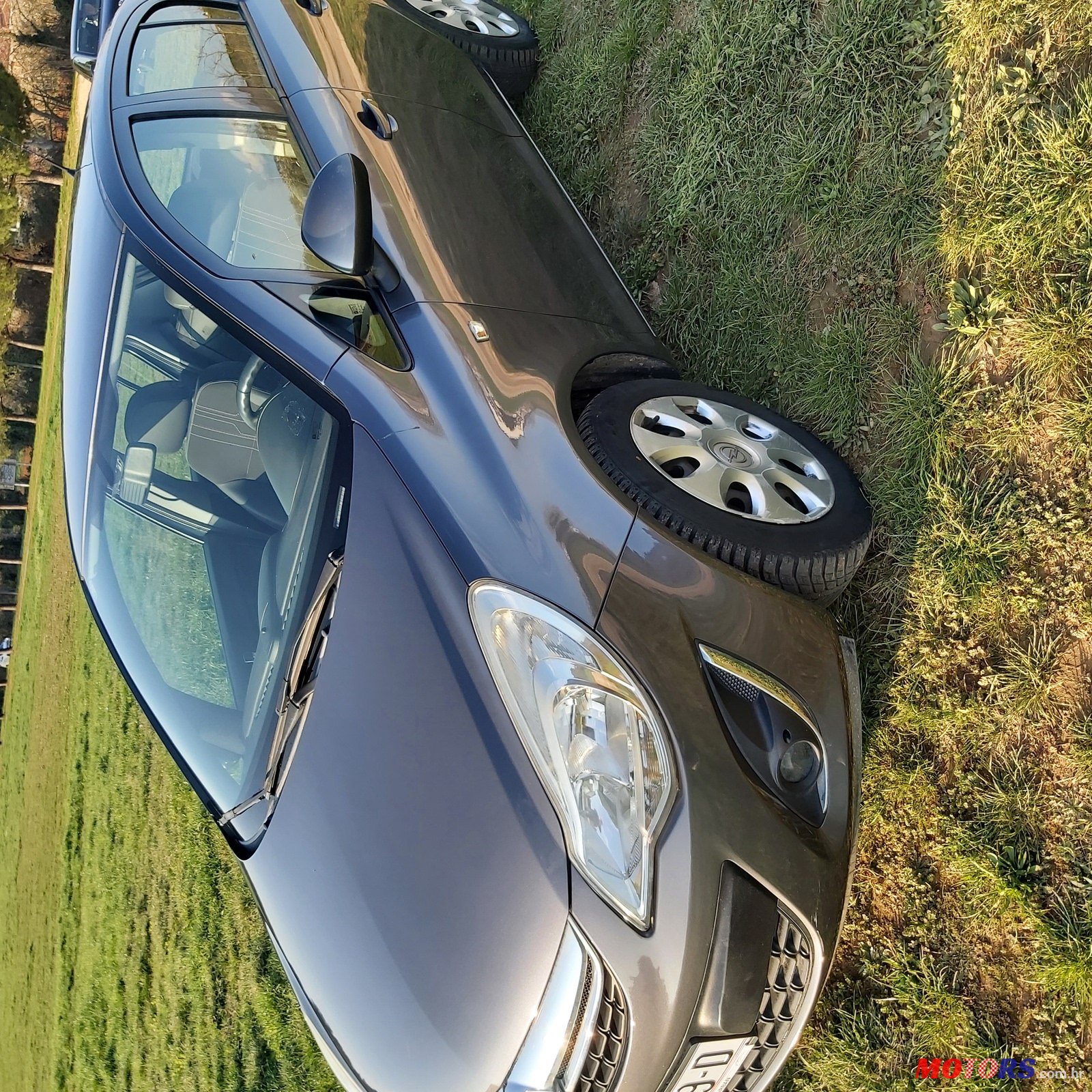 2012' Opel Corsa photo #4