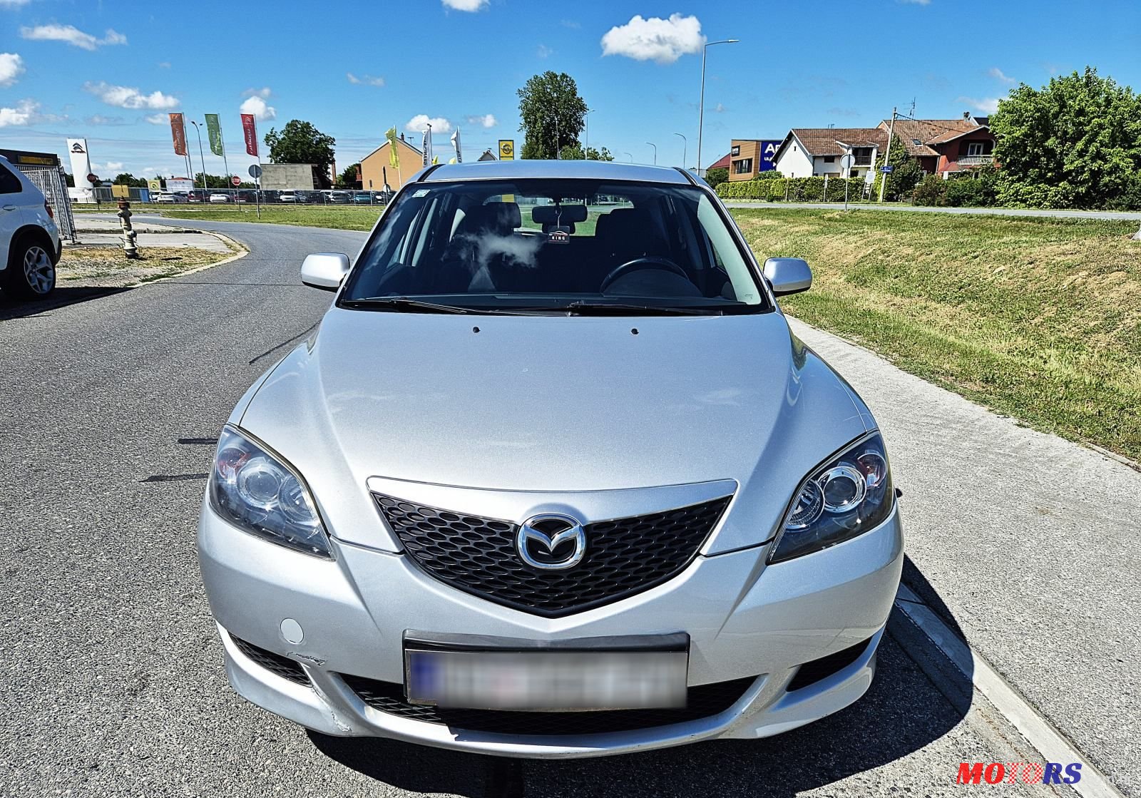2005' Mazda 3 Sport 1,4 I Ce photo #1