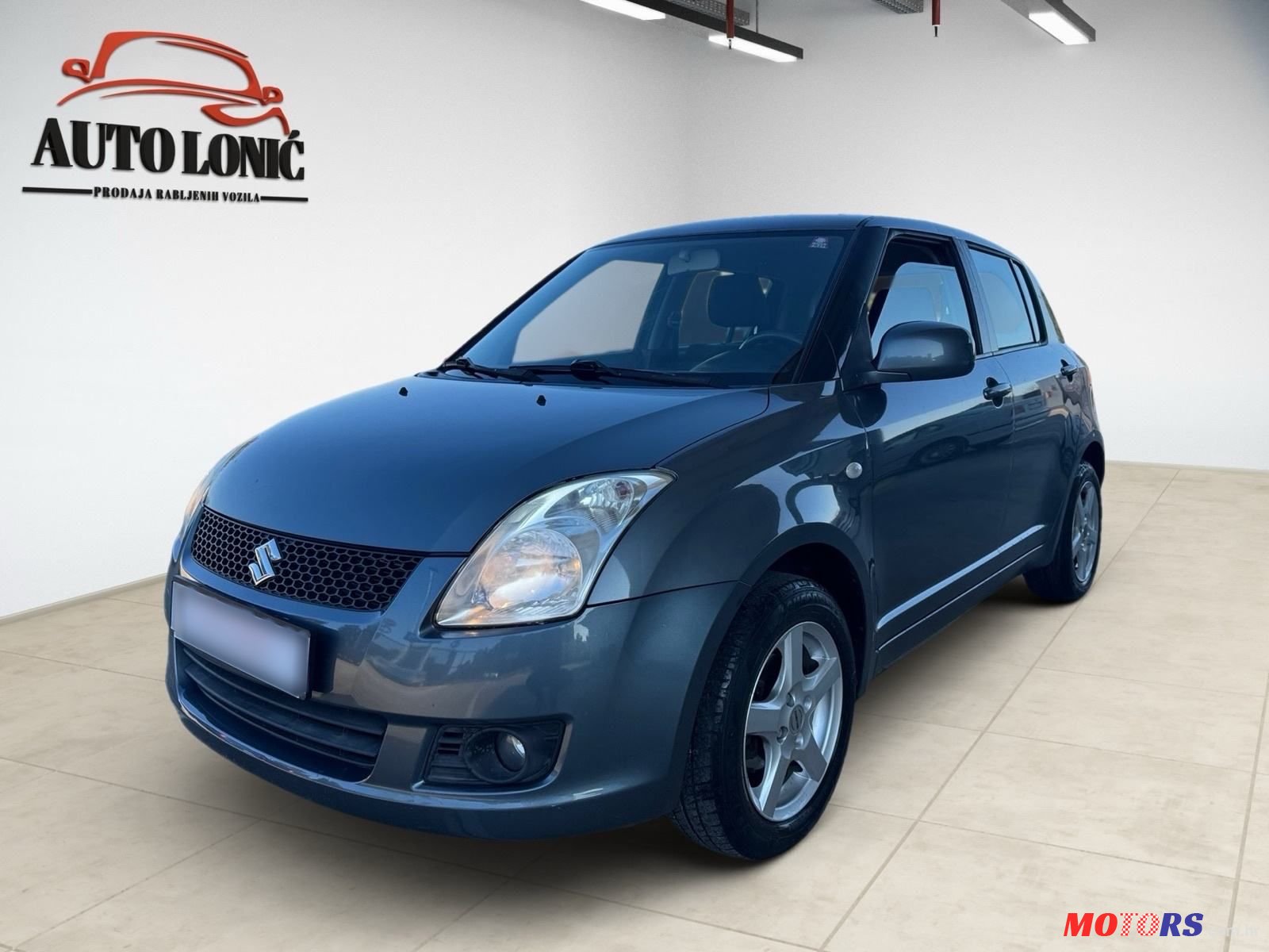 2009' Suzuki Swift 1,3 Gs photo #2