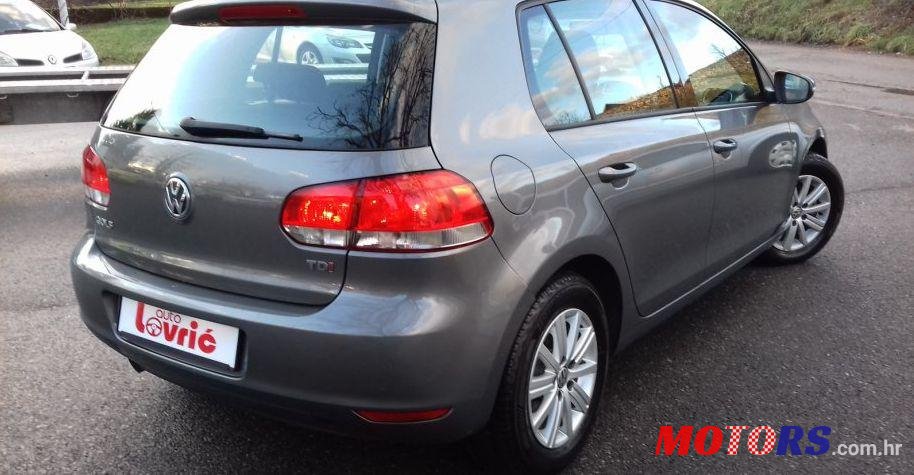 2011' Volkswagen Golf VI 1,6 Tdi photo #2