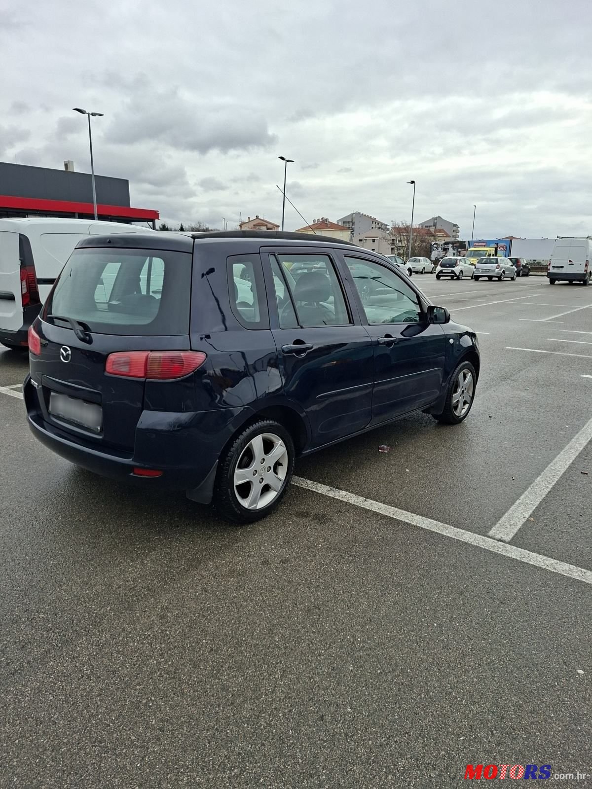 2005' Mazda 2 1.25 photo #4