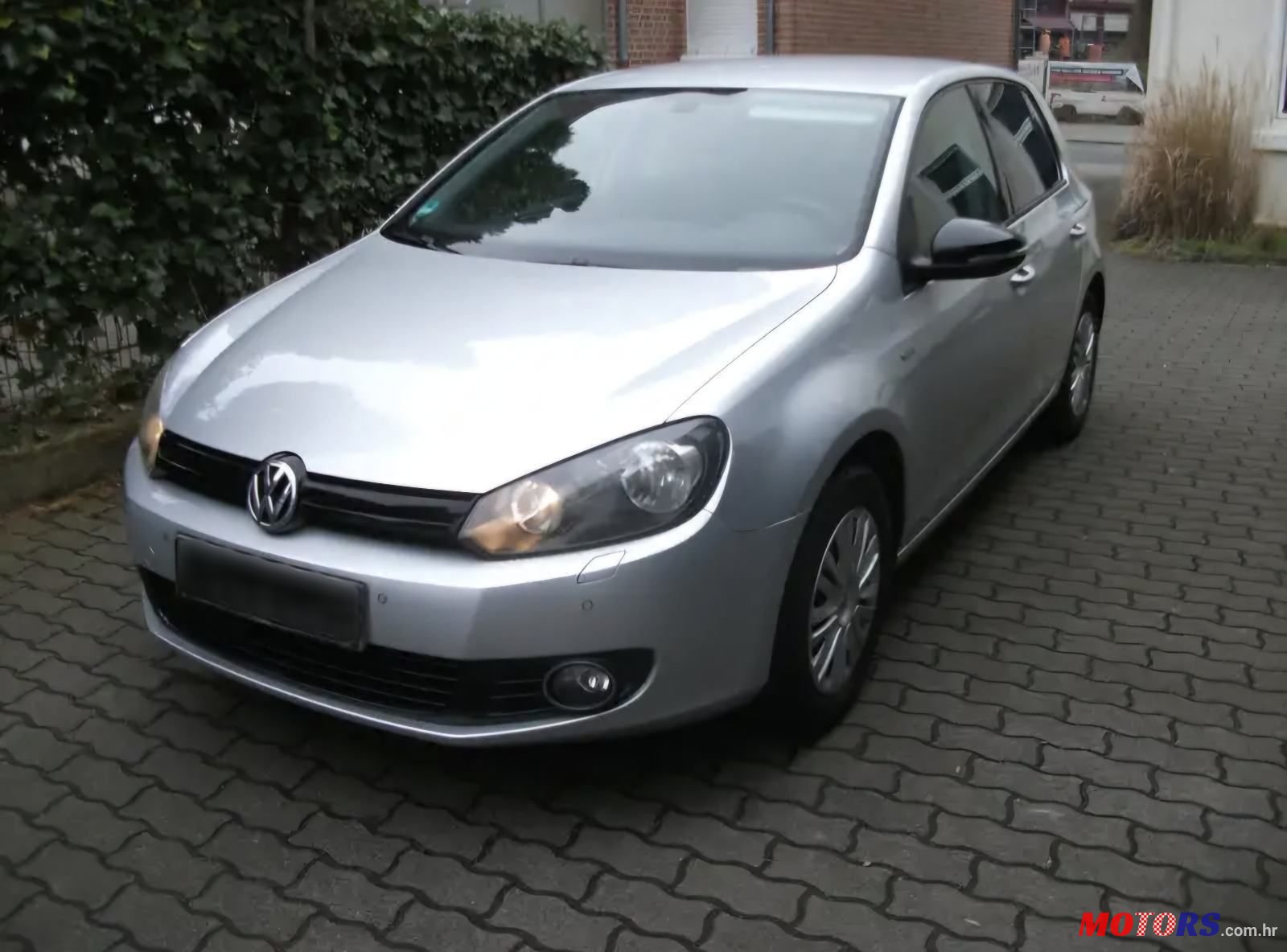 2012' Volkswagen Golf VI 1,6 Tdi photo #1