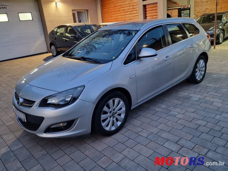 2014' Opel Astra Karavan photo #2
