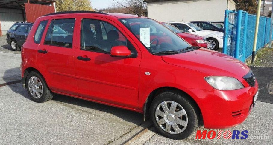 2003' Mazda 2 Cd68 Se photo #1