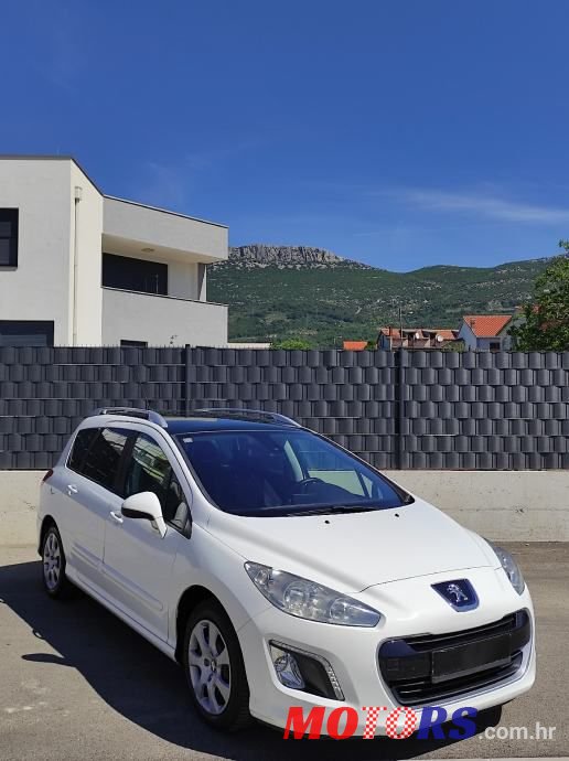 2014' Peugeot 308 Sw photo #2