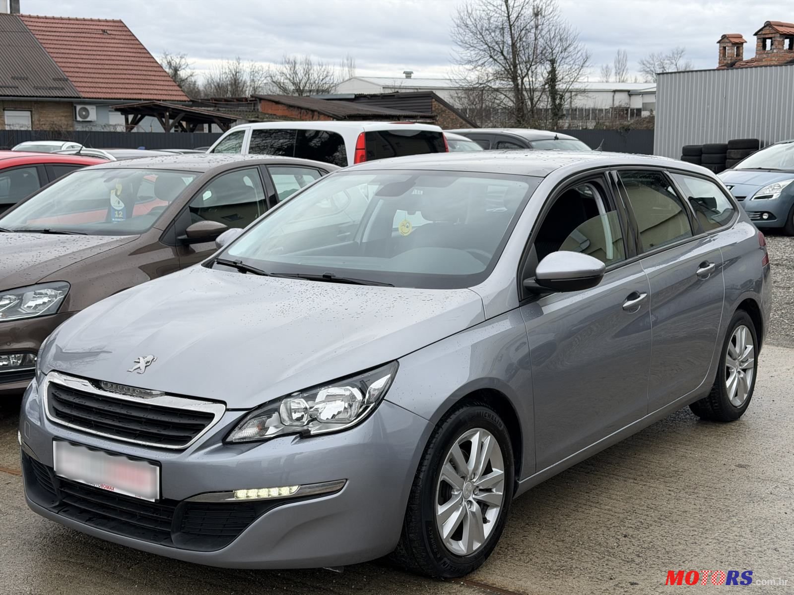 2015' Peugeot 308 Sw photo #1