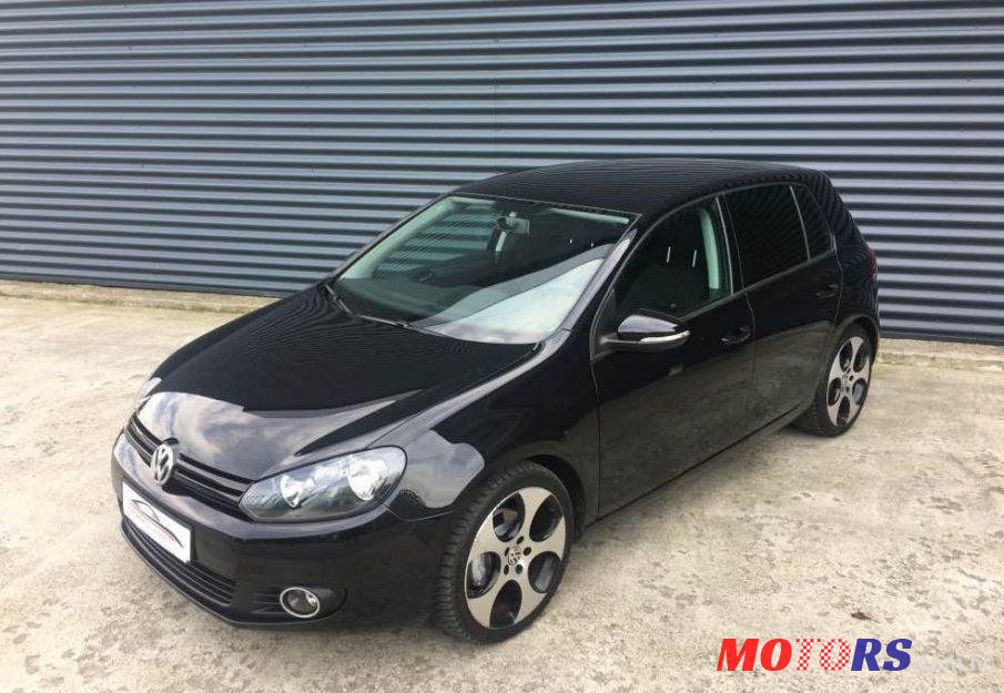 2011' Volkswagen Golf VI 1,6 Tdi photo #1