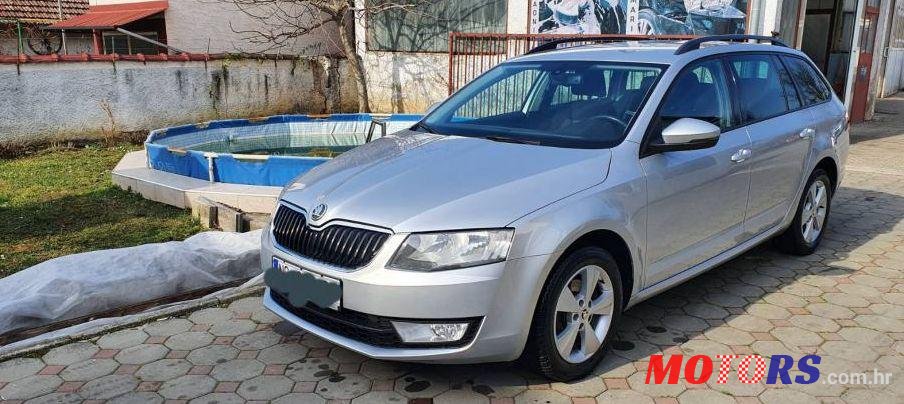 2013' Skoda Octavia Combi 1,6 Tdi photo #1