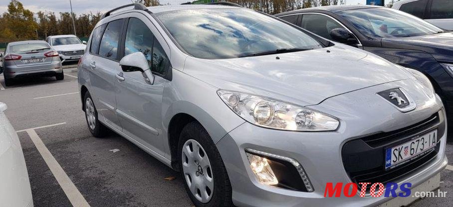 2014' Peugeot 308 Sw 1,6 Hdi photo #1