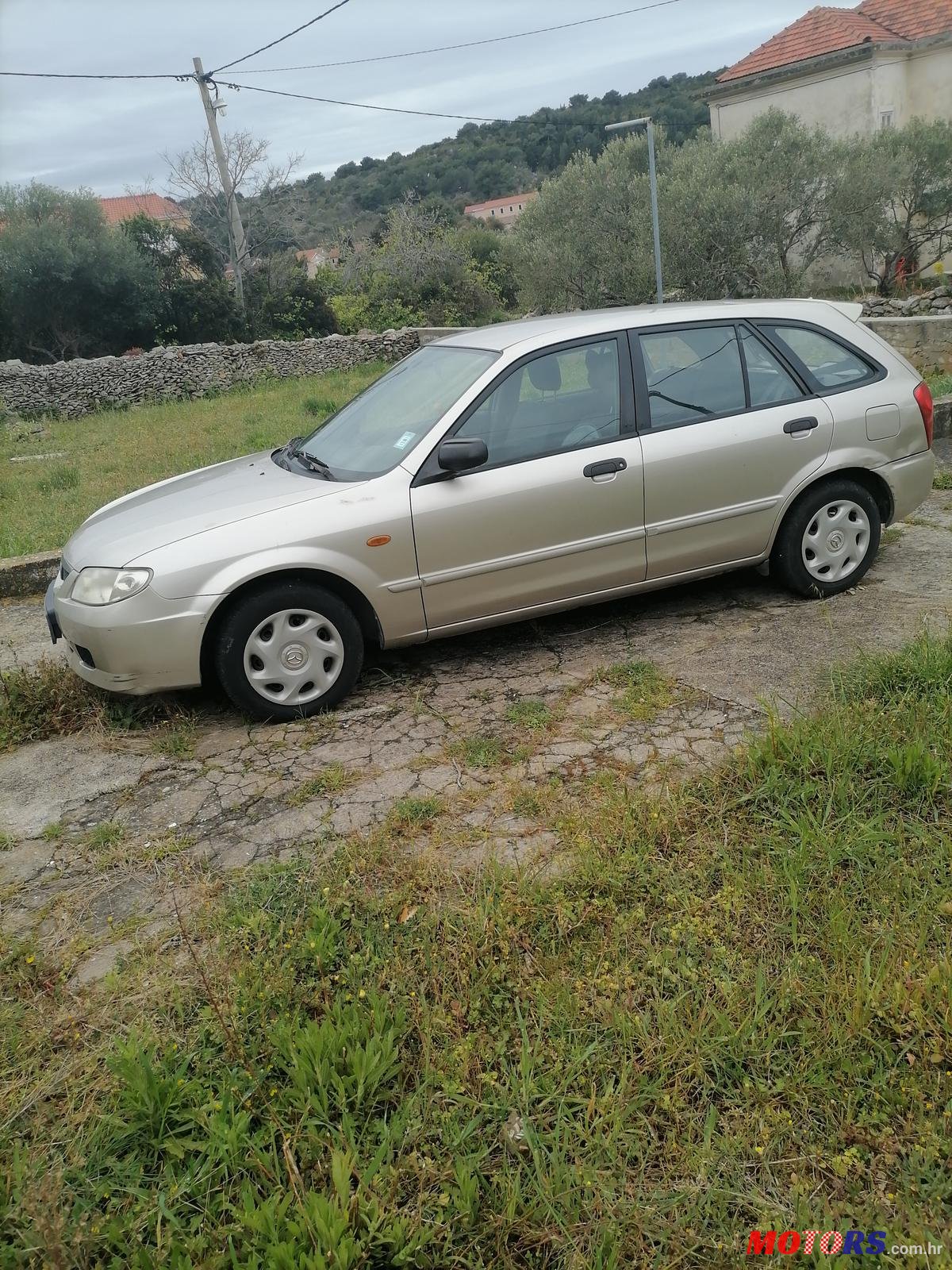 2002' Mazda 323 F 1,3I  EVISION photo #2