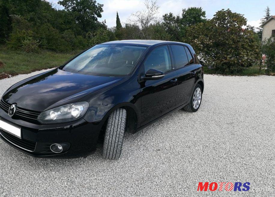 2012' Volkswagen Golf VI 1,6 Tdi photo #1