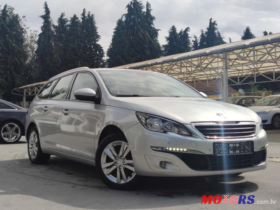 2015' Peugeot 308 Sw photo #1