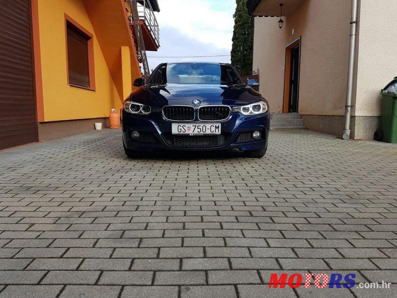 2014' BMW 3 Series 320Xd photo #2
