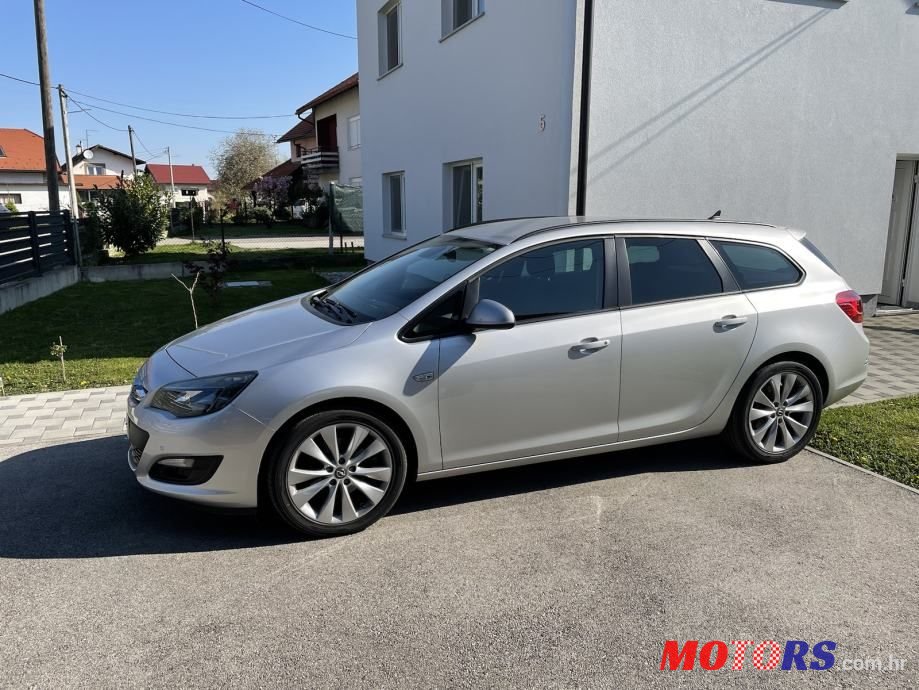 2014' Opel Astra Karavan photo #1