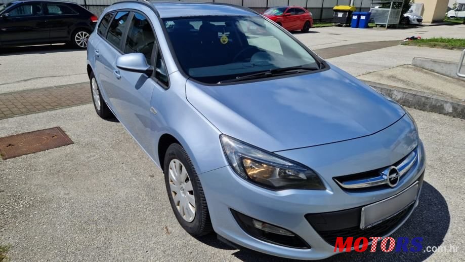 2014' Opel Astra Karavan photo #5