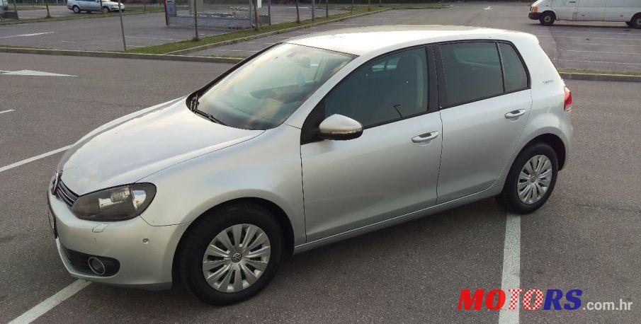 2010' Volkswagen Golf VI 1,6 Tdi photo #1