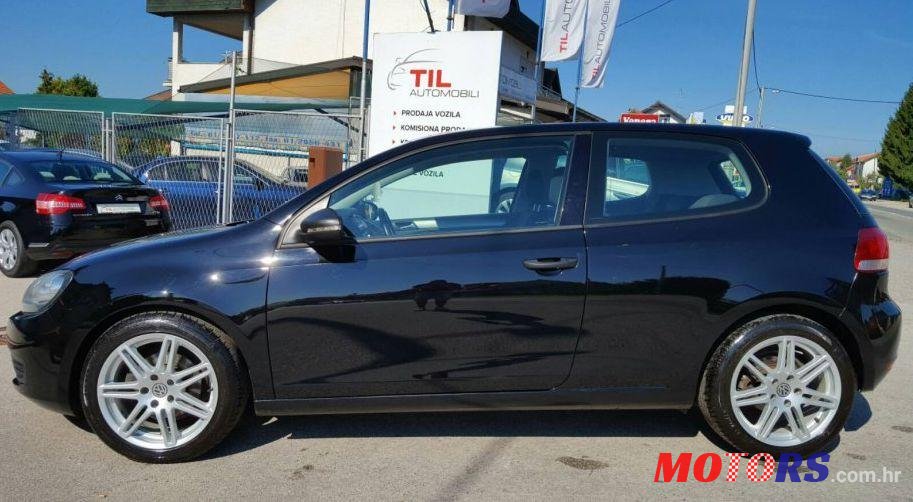 2012' Volkswagen Golf VI 1,6 Tdi photo #1