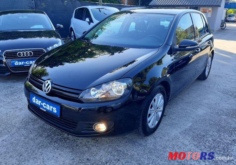 2011' Volkswagen Golf VI 1,6 Tdi photo #1