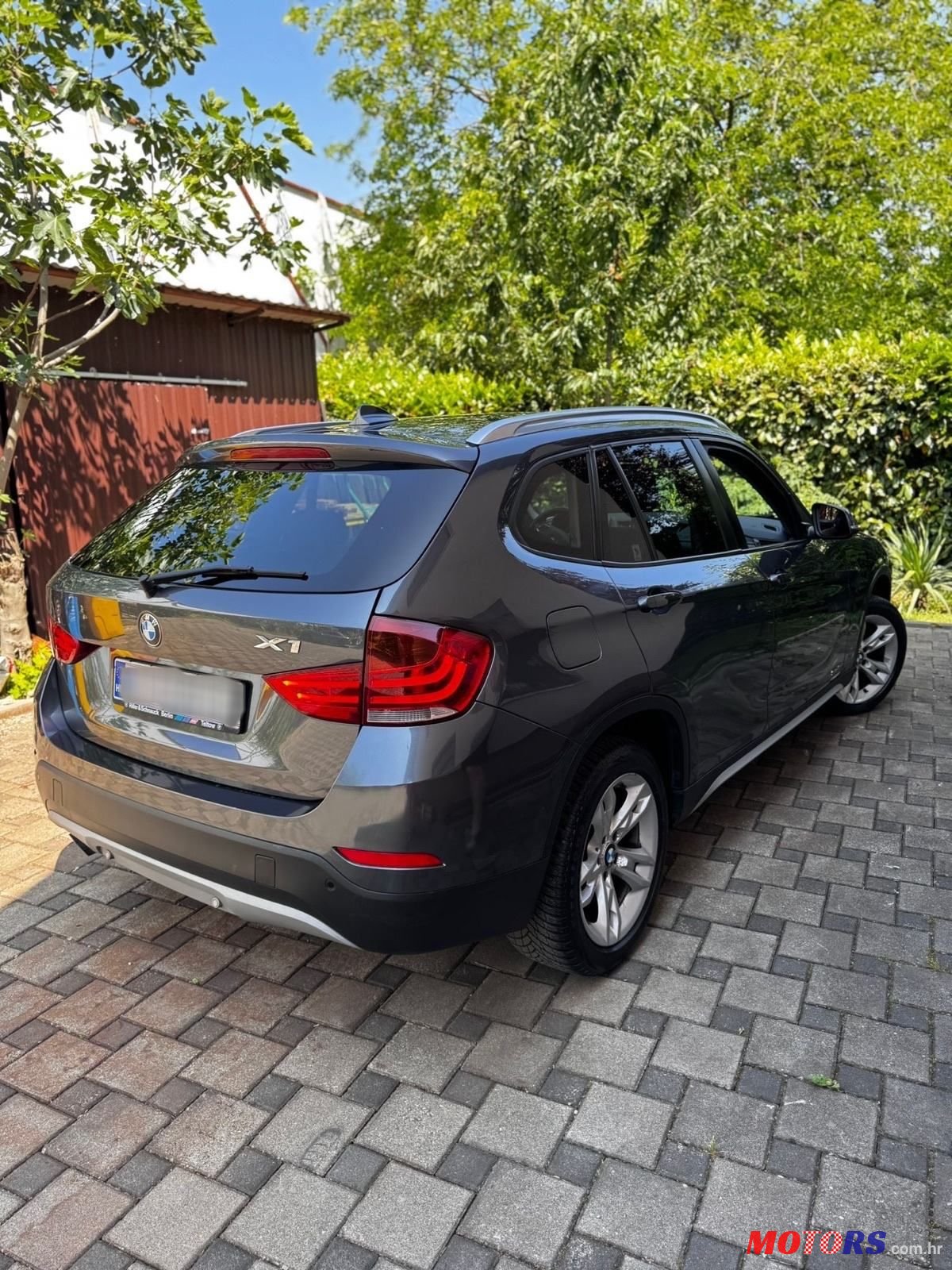 2014' BMW X1 Sdrive18D photo #3