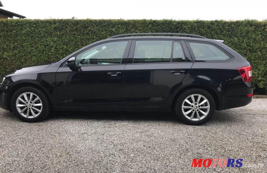2013' Skoda Octavia Combi 1,6 Tdi photo #1