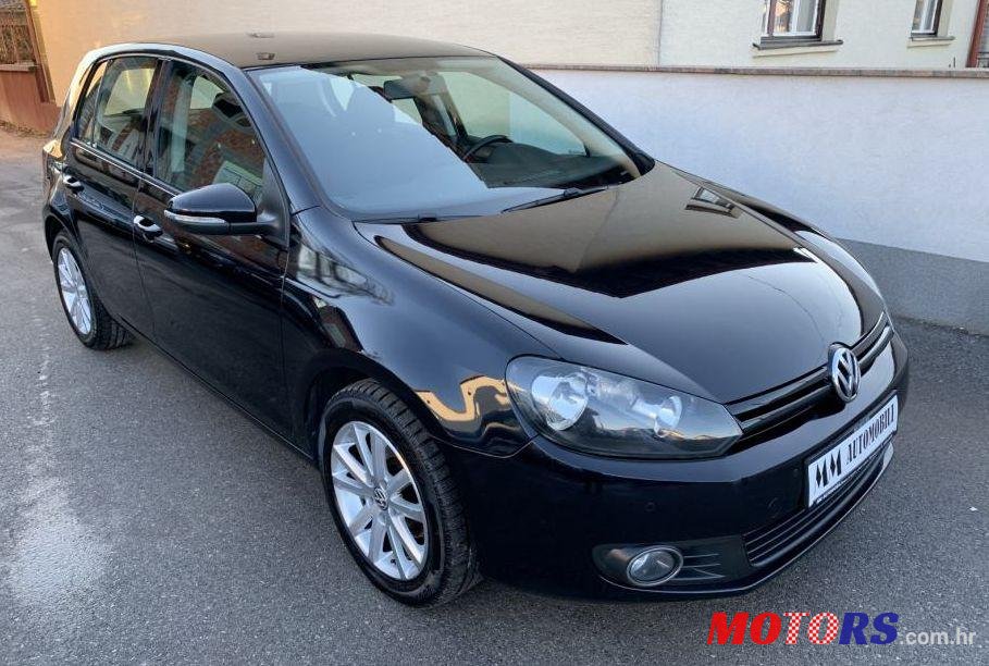 2009' Volkswagen Golf VI 1,6 Tdi photo #1