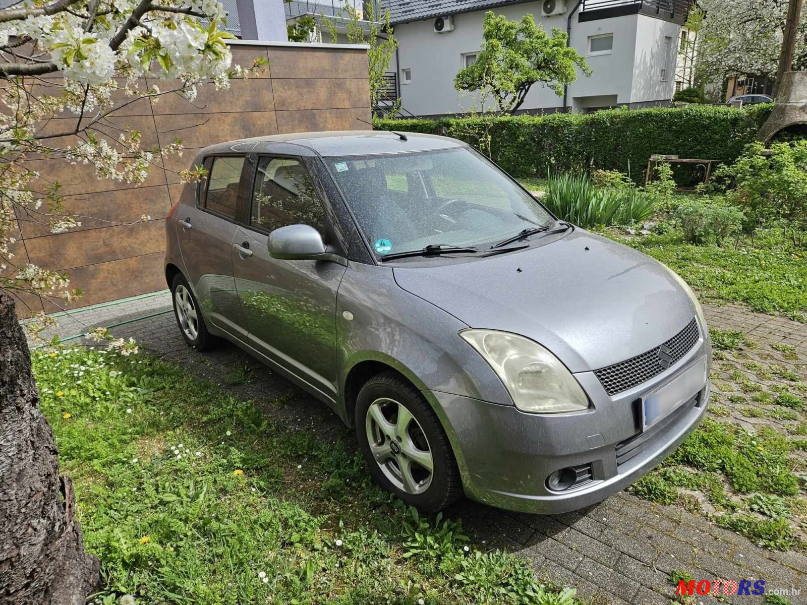 2009' Suzuki Swift 1,3 Gc photo #1