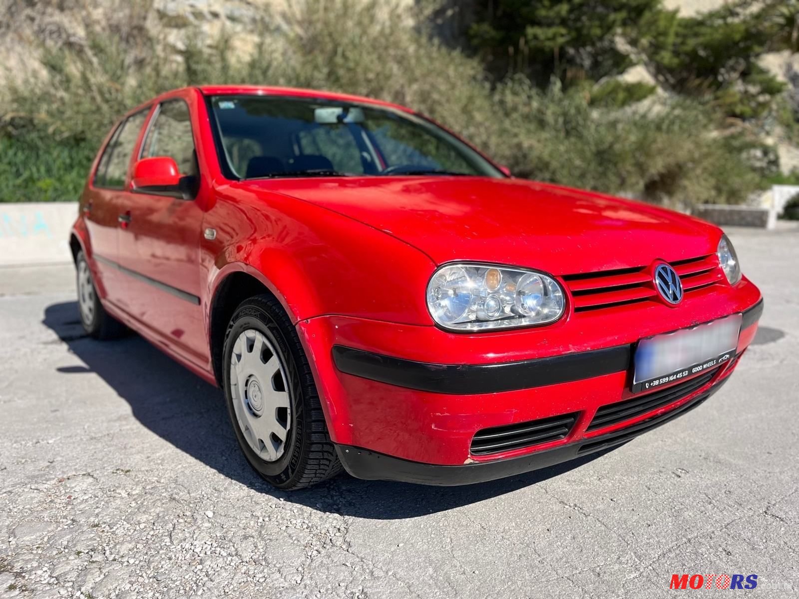 1998' Volkswagen Golf IV 1,4 photo #1