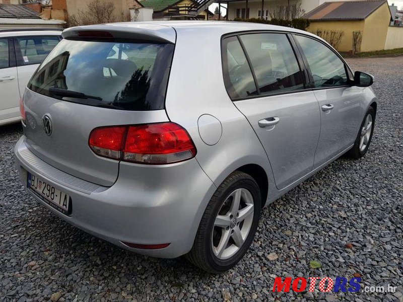 2011' Volkswagen Golf VI 1,6 Tdi photo #1