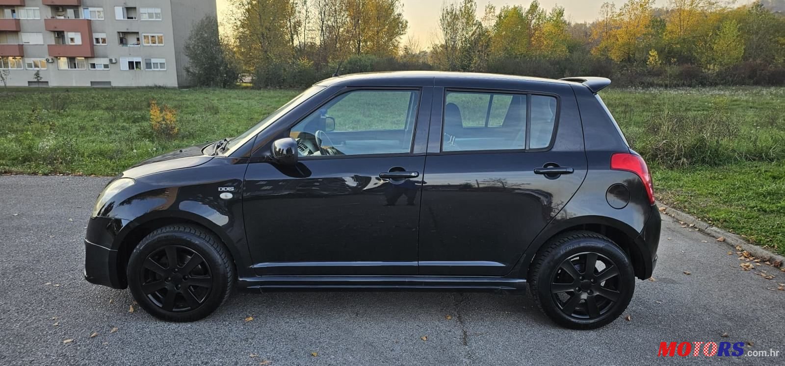 2009' Suzuki Swift 1,3 Glx photo #2