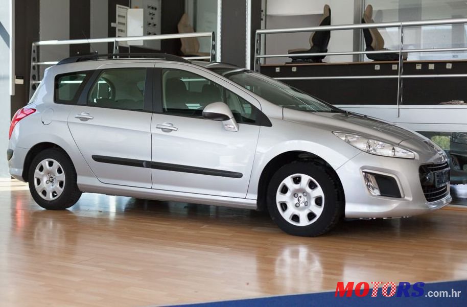 2013' Peugeot 308 Sw 1,6 Hdi photo #1