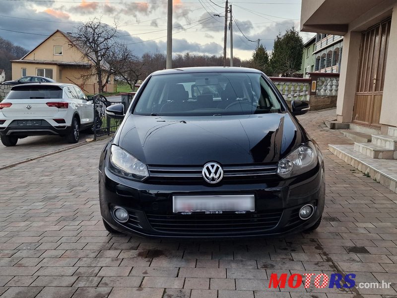 2012' Volkswagen Golf VI 1,6 Tdi photo #3