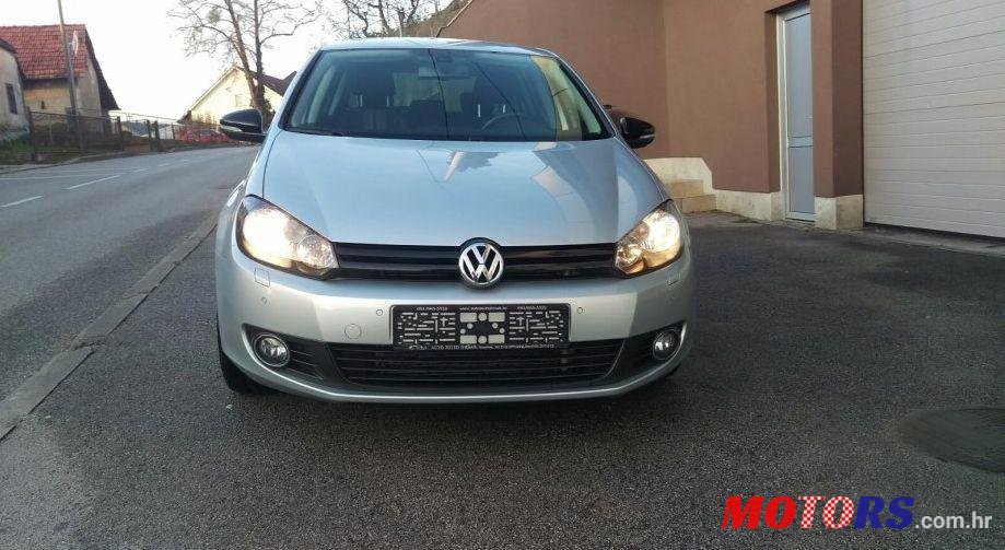 2012' Volkswagen Golf VI 1,6 TDI photo #2