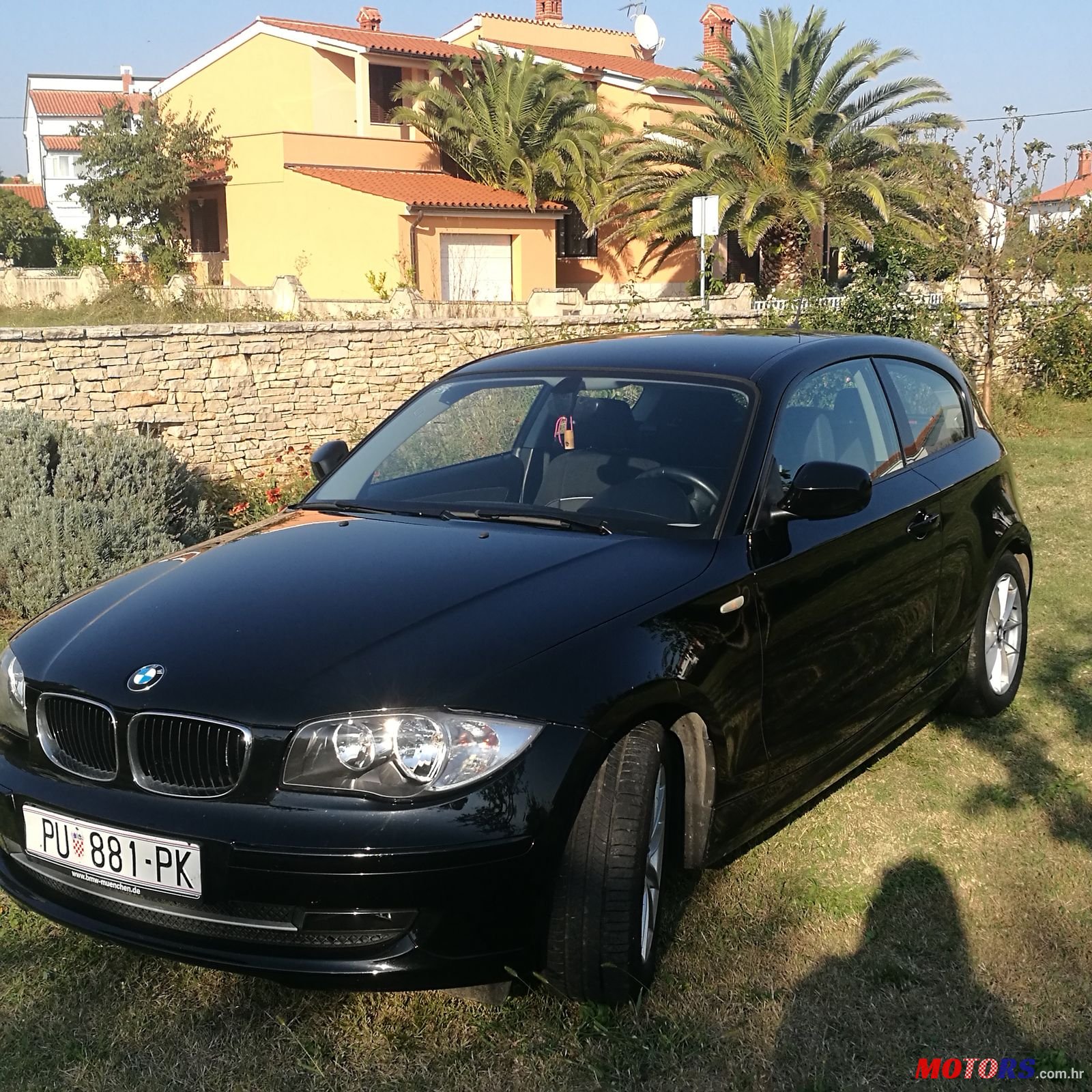 2011' BMW 1 Series 3 Door 116d photo #1